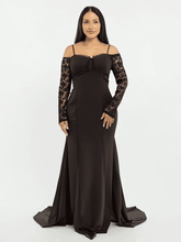 “Elegant Black Satin Gown with Lace Sleeves”