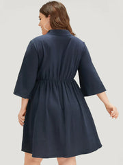“Elegant Navy Blue Shirt Dress with Statement Belt”